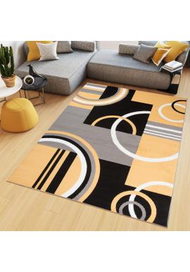 Žltý koberec s moderným vzorom