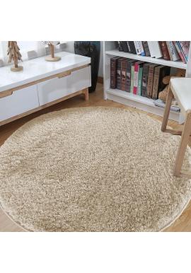 Okrúhly shaggy koberec v béžovej farbe