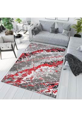 Sivo-červený koberec s abstraktným vzorom