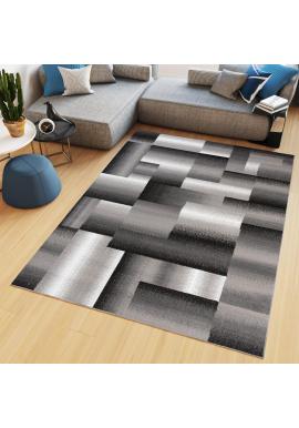 Vzorovaný koberec v sivej farbe