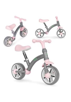 Sivo-ružový balančný bicykel pre deti v akcii